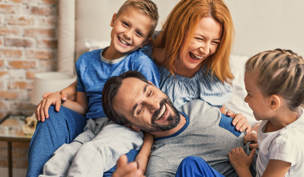 A Family Laughing Together